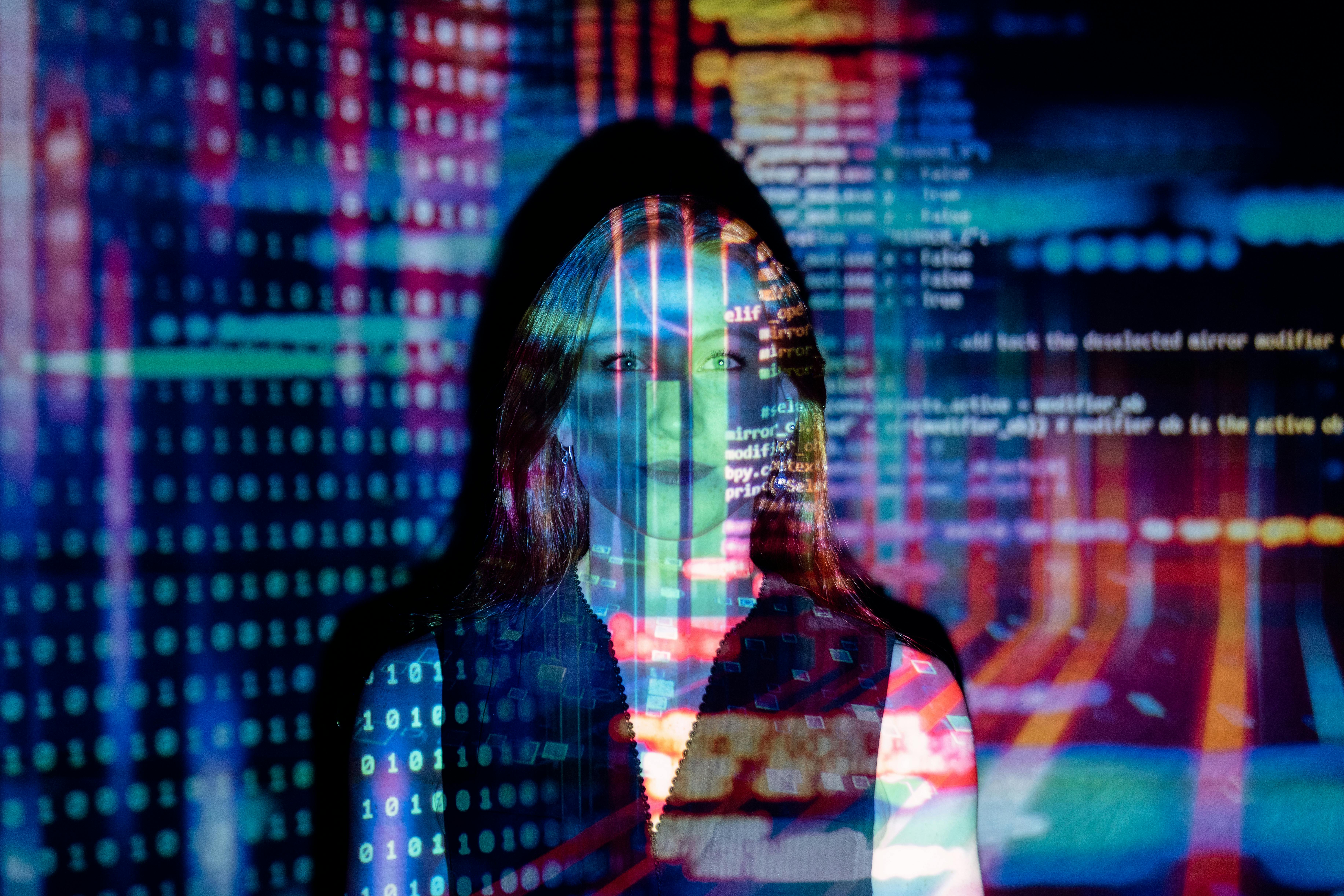 Data visualization projected over woman working
